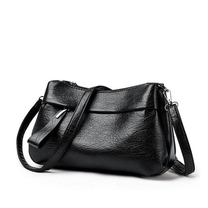 💥Hot Sales - 49% OFF🔥kvinners trendy PU-skinn crossbody og skulderveske