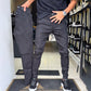 Slim-fit casualbukser i ensfarget stoff for menn